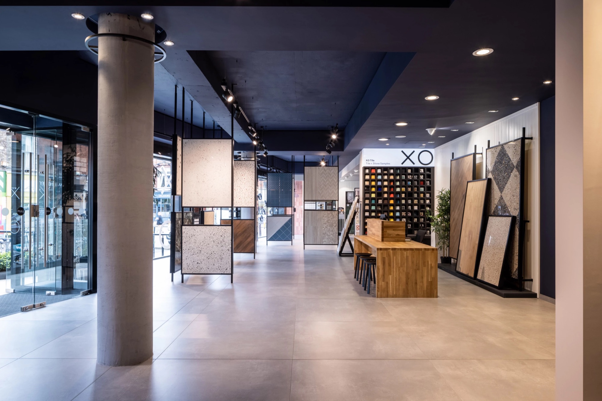 Showroom – surfaces displayed as hero elements, not product shots.